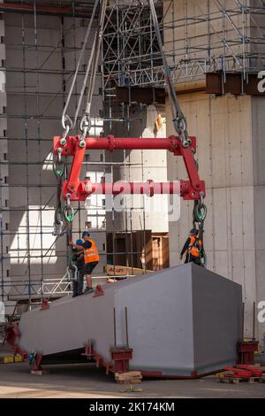 mounting a pylon segment on a traverse for heavy load on  the construction site of the new river Rhine bridge of the Autobahn A1 between Cologne and L Stock Photo