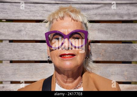 Woman sunbathing with eyes closed Stock Photo