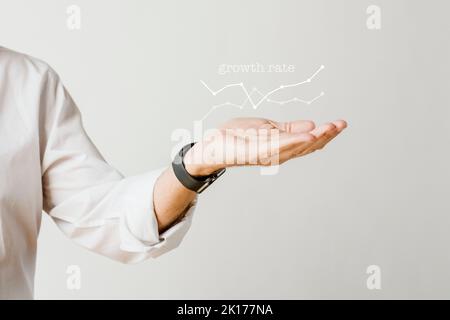 Digital graph with businessman hand overlay Stock Photo - Alamy