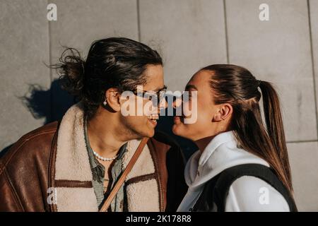 Young couple standing together Stock Photo