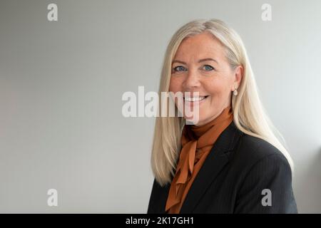 Portrait of businesswoman looking at camera Stock Photo