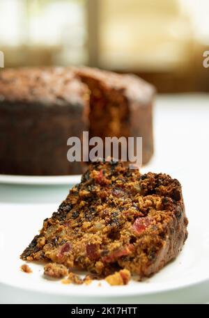 Freshly baked fruitcake made with Glacier Cherries Mixed Peel Currants Sultanas Stock Photo