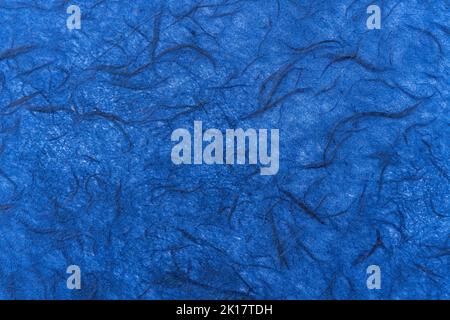 Straw paper texture background made from recycled sustainable biodegradable resources with a natural blue textured effect pattern, stock photo image Stock Photo