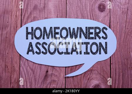 Text sign showing Homeowners Association. Word Written on Organization with fee for upkeeps of Gated Community Stock Photo