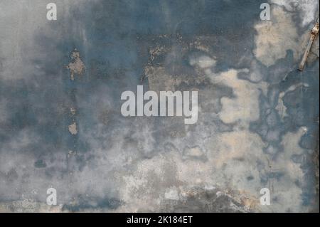 Textured background of gray wall of shabby building covered with abstract fantasy stains Stock Photo