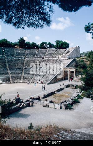 Theatre at Epidaurus - a small city (polis) in ancient Greece, on the Argolid Peninsula at the Saronic Gulf, best known for its ancient Greek sanctuary. March 1980. Archival scan from a slide. Stock Photo