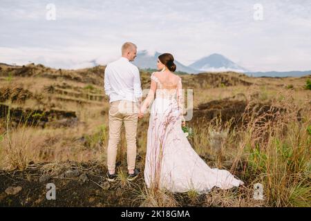 February 14, 2021. Bali, Indonesia. Wedding day with stylish couple in mountains. Stock Photo