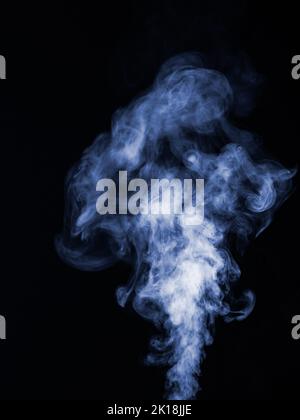 Blue smoke on a black background, rising in balls as an abstract effect Stock Photo