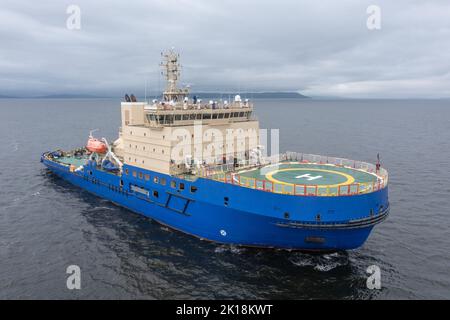 The ice breaker with a platform for helicopter landing, in the middle of a gulf. Stock Photo