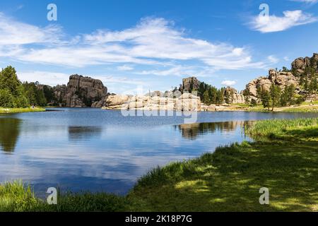 Clouds reflecting in Sylvan Lake, Custer State Park, South Dakota, USA Stock Photo