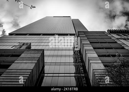 A low angle grayscale shot of a modern architectural building in Sydney, Australia Stock Photo