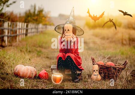 Little girl in halloween costume on nature Stock Photo