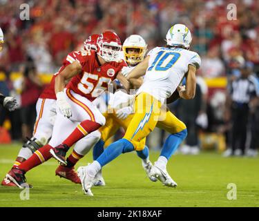 SEP 15, 2022: Kansas City Chiefs defensive end George Karlaftis (56) apples pressure on Los Angeles Chargers quarterback Justin Herbert (10)at Arrowhead Stadium Kansas City, Missouri. TheChiefs beat the Chargers 27-24 Jon Robichaud/CSM. Stock Photo