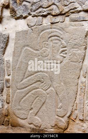 The famous Los Danzantes, carved stone monuments next to building L, Monte Alban Archeological site, Zapotec civilization ruins, Oaxaca, Mexico Stock Photo