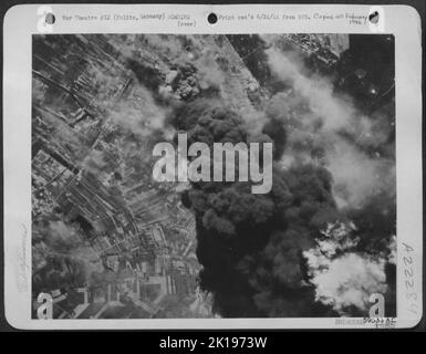 Ugly Black Smoke Rises From The Nazi Synthetic Oil Plant At Politz, Germany, As Consolidated B-24 Liberators Of Us 8Th Aaf Attacked June 20 1944. Stock Photo