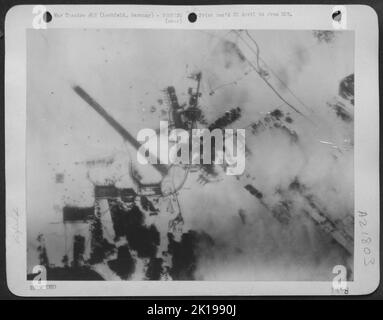 Forts Blast Nazi Airdrome -- While Consolidated B-24 Liberators Were Paying Their Lethal Respects To Friedrichshafen, Boeing B-17 Flying Fortresses Of The Us 8Th Air force Were Hammering The Lechfeld Airdrome In Southwestern Germany During Saturday'S Daylight Op Stock Photo