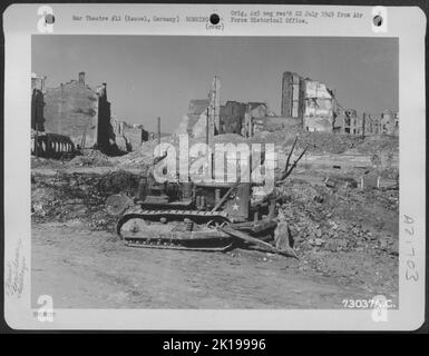 Engineers Clean Away The Rubble From These Bomb Damaged Buildings In Kassel, Germany. 29 April 1945. Stock Photo