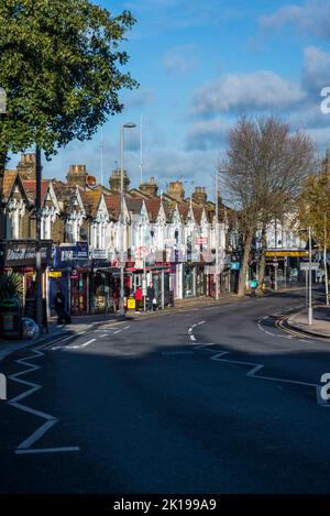 A row of houses and shops on Hoe Street, Walthamstow, London, England, UK Stock Photo