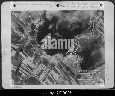 Synthetic oil plant of Braunkohle-Benzin A.G. at Bohlen, Germany, during attack by 8th Air Force, 12 May 1944. Stock Photo