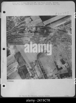 This Aerial Phtoo, Taken By A North American P-51 Mustang Tactical Reconnaissance Pilot, 1St Lt. Leland C. Shoaf, Dixon, Ill., Shows Belgern Marshalling Yards After A Heavy Attack By 9Th Af Martin B-26 Marauders On 15 April 1945. Choked With Damaged Cars Stock Photo