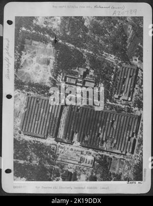 The Nazi aero engine works at Basdorf, 15 miles north of the center of Berlin, was heavily damaged by the U.S. 8th AF heavy bomber attack of 21 June 44. Twenty direct hits gutted the large main workshop, four smaller workshops were seriously damaged Stock Photo