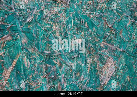 Pressed blue wood chipboard background pattern texture. Stock Photo