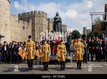 Crowds sang the national anthem and gave three cheers for King Charles III during a proclamation ceremony in Windsor at the Queen Victoria statue. Stock Photo