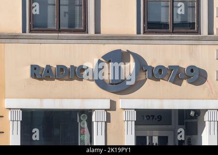 Maribor, Slovenia - June 2, 2022: Logo and sign of Radio 1 107.9 in Slovenia. Stock Photo