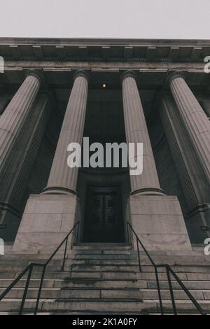 A vertical shot of columns and facade of a building Stock Photo