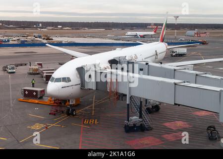 Domodedovo, Russia - December 21, 2019: Boeing 777-300er plane by Emirates Airline is loading at Domodedovo International Airport  of Moscow Stock Photo