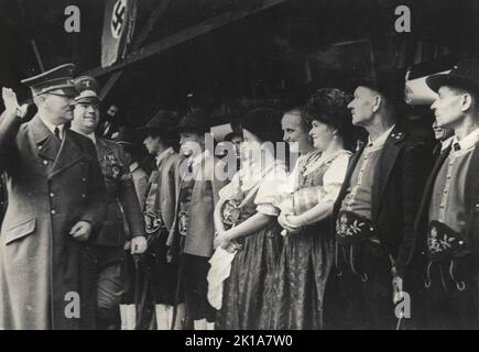 hitler cheered by peasants in traditional costumes, 1941 Stock Photo