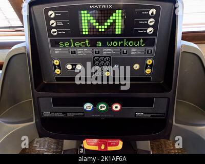 Control panel on a Matrix advanced treadmill for exercising and fitness training in a gym. Stock Photo