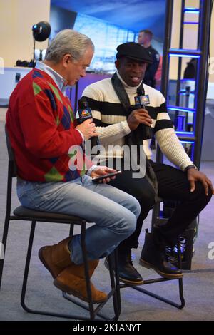 NFL Hall of Fame athlete Deion Sanders participates in media row at Mall of America in Bloomington, Minnesota, during the week of Super Bowl LII. Stock Photo