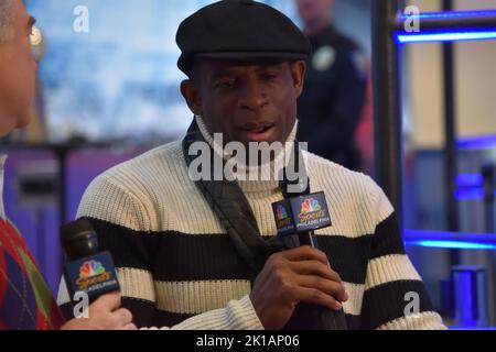 NFL Hall of Fame athlete Deion Sanders participates in media row at Mall of America in Bloomington, Minnesota, during the week of Super Bowl LII. Stock Photo