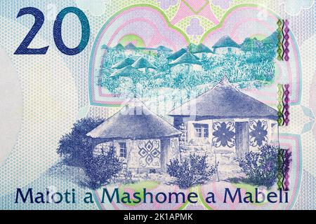 Small houses from banknotes of Lesotho - Maloti Stock Photo