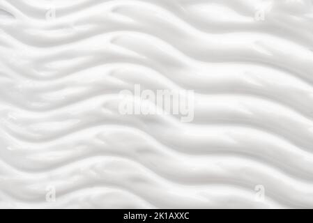 Texture, background of cosmetic cream in white color. Cream for face and skin Stock Photo