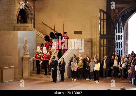 London, UK. 17th Sep, 2022. Queen Elizabeth II lying in state as the nation gets the opportunity to pay their last respects. Royal guards, taken from units that serve the Royal households, maintain a 24-hour vigil next to the Queen's casket. Westminster Hall at the Palace of Westminster London. UK. Credit: Phil Crow/Alamy Live News Stock Photo