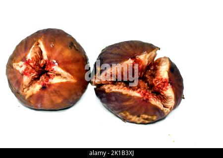 close up of figs parchment fruit isolated on white background, fig is the edible fruit of Ficus carica, a species of small tree in the flowering plant Stock Photo