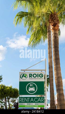 Cala d'Or, Spain; september 10 2022: Sign of the tourist transfer bus of the Roigbus company. Cala d'Or, island of Mallorca, Spain Stock Photo