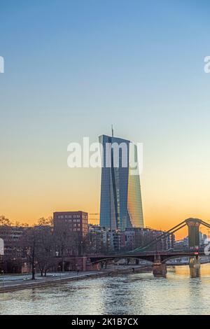 Frankfurt, Germany - February 13, 2021: new building of european central bank - EZB - in Frankfurt at river Main in sunset. Stock Photo