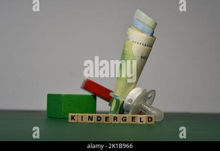 Bricks Banking Note the word inflation with wodden bricks and a euro bank note Stock Photo ...