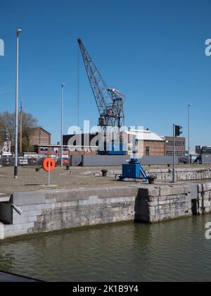 Antwerp, Belgium, April 17, 2022, Big blue crane at the docks in Antwerp Stock Photo
