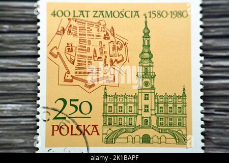 Cairo, Egypt, August 15 2022: Old used Polish postage stamp printed in Poland 1980 400 Years of Zamosc anniversary, the most impressive fortresses in Stock Photo