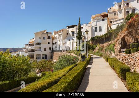 Frigiliana Spain. Hillside gardens of white washed village of frigiliana, Andalusia, Malaga province, Axarquía, Spain Stock Photo