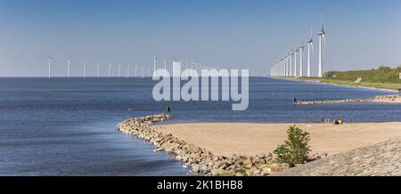 Panorama of  windturbines in the IJsselmeer lake near Urk, Netherlands Stock Photo