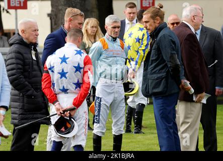 Jockeys and connections observe a minute's silence in memory of Queen Elizabeth II, ahead of the Virgin Bet Ayr Gold Cup day at Ayr Racecourse, Ayr. Picture date: Saturday September 17, 2022. Stock Photo