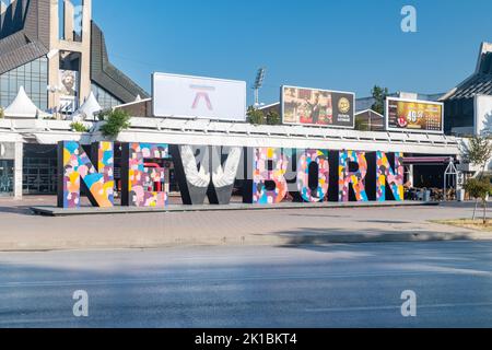 Pristina, Kosovo - June 5, 2022: Newborn Monument (NEWBORN). Typographic sculpture and tourist attraction. Stock Photo