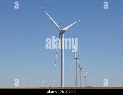 (220917) -- BEIJING, Sept. 17, 2022 (Xinhua) -- Photo taken on Sept. 13, 2022 shows some wind turbines at the 100-MW Zhanatas wind farm near the city of Zhanatas in the Zhambyl Region, Kazakhstan. The wind farm, with 40 wind turbines and a combined capacity of 100 megawatts, is jointly-held by China Power International Holding and Visor Kazakhstan. (Photo by Dmitry Vasilenko/Xinhua) Stock Photo
