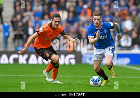 Glasgow, UK. 17th September 2022.   Liam Smith of Dundee Utd and Ryan Kent of Rangers during the cinch Premiership match at Ibrox Stadium, Glasgow. Picture credit should read: Neil Hanna / Sportimage Stock Photo
