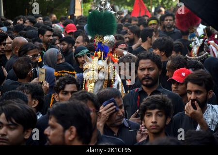 A large number of mourners attend the Chehlum procession to commemorate ...